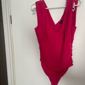 Hot pink express body contour bodysuit. L